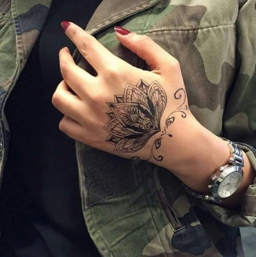 Elegant Lotus Flower Tattoo - Image 4