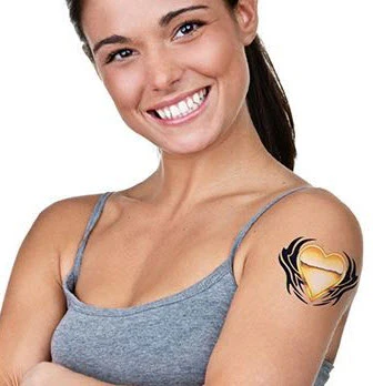 Golden Tribal Heart Tattoo - Image 2