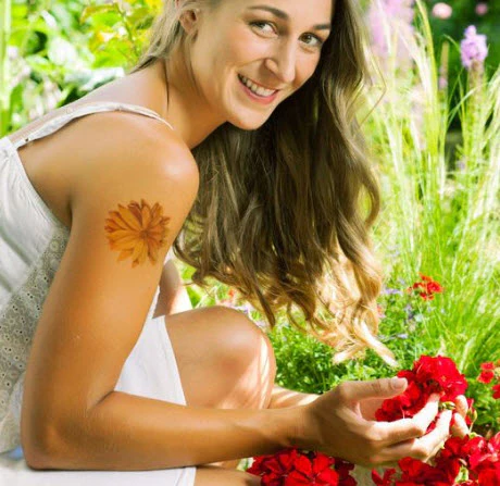 Orange Pastel Daisy Tattoo - Image 2