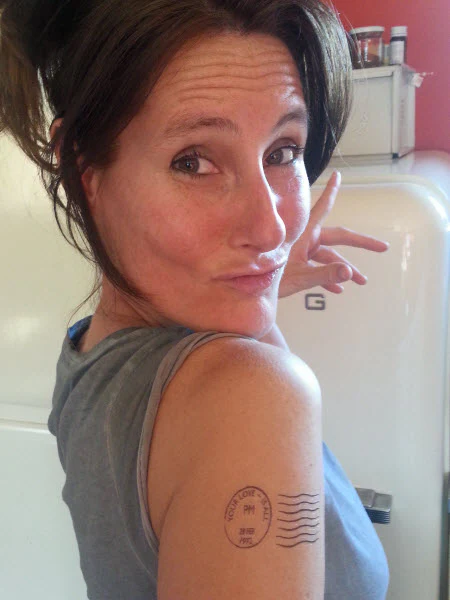 Stamp "Your Love Is All" Tattoo - Image 3